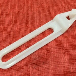 ARM, OPEN/CLOSE PANEL STOPPER